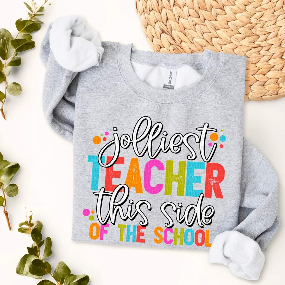 Jolliest Teacher This Side Of The School - SHIRT SDD.24